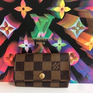100% authentic Louis Vuitton six key card holder